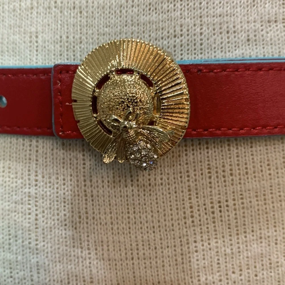 Red and turquoise reversible belt with gold bee buckle